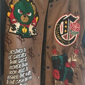 Reason Brown Varsity Jacket with Graphic Designs